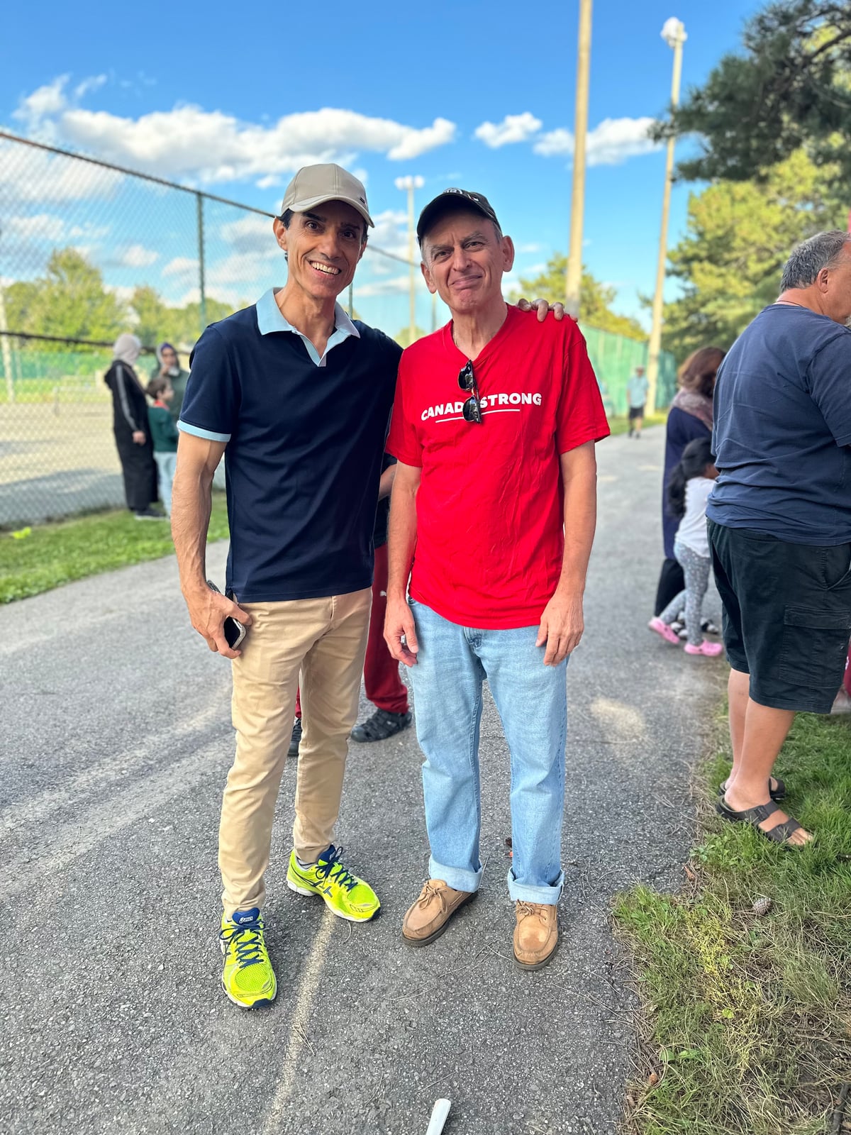 Sinan Erdemir with a neighbour at a summer park event